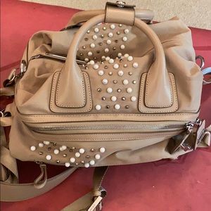 Caraa studded limited edition studio bag